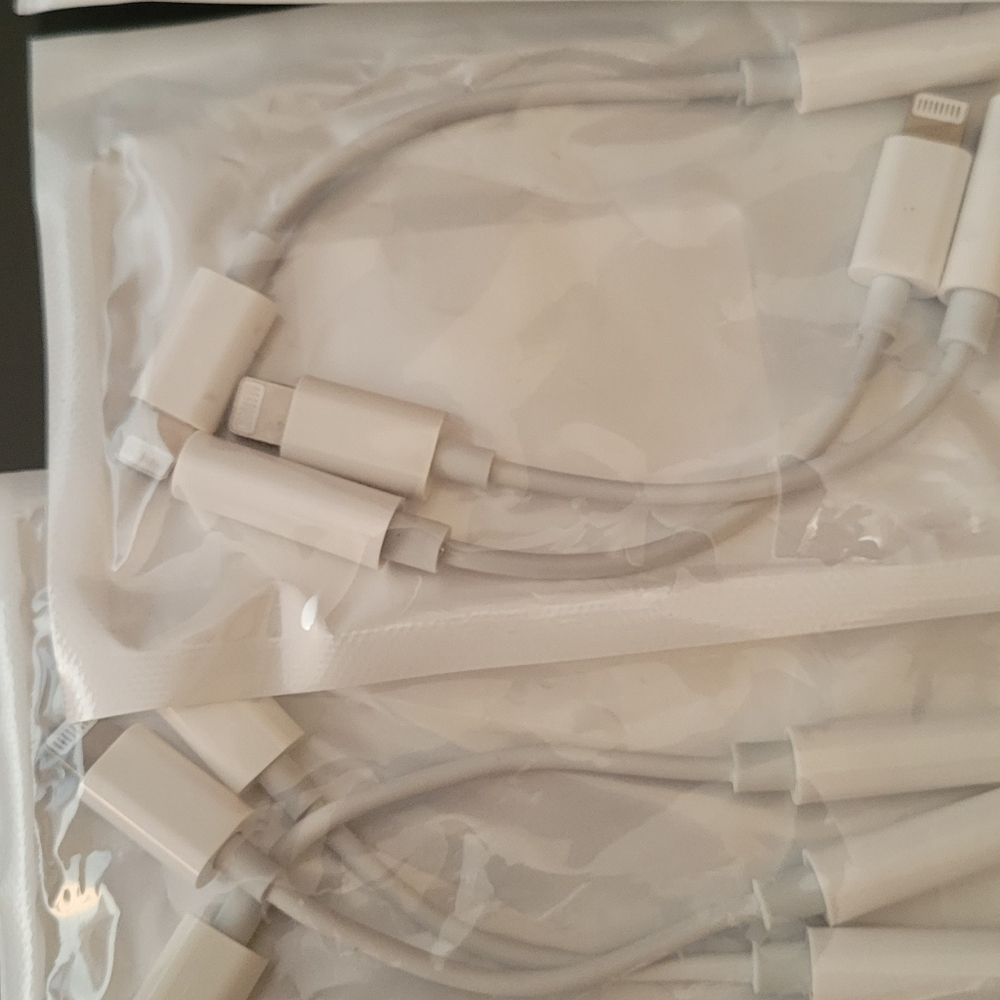 Iphone adaptor to aux cable